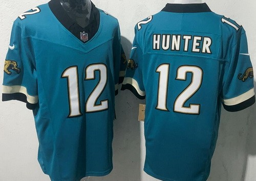 Jacksonville Jaguars #12 Travis Hunter Limited Green Throwback FUSE Vapor Jersey
